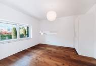Gartenwohnung mit erstklassiger Architektur in bester Stadtlage - sehr großer Garten, ausgezeichnete Parksituation