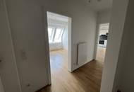 UNBEFRISTET - helle 2,5-Zimmer Dachgeschosswohnung mit Wohnküche, Schrankraum, 26 m2 Dachterrasse und Kellerabteil nahe Schönbrunn