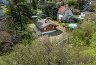 „Wohnen im Einklang mit der Natur – Stilvolles Holzhaus in traumhafter Ruhelage auf unverbaubarem Grundstück“