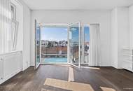 Weitblick, Ruhe & zentrale Lage – Sonnige Altbauwohnung mit Balkon