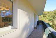 Reizende 3-Zimmer-Wohnung mit 2 Balkonen, gartenseitiger Veranda und Garagenplatz