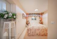 Beeindruckende Villa mit gepflegtem Garten und Pool als Investment