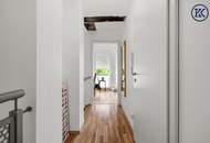 Zuhause im Grünen – Lichtdurchflutete Maisonette mit Gartenoase und Wasserblick