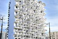 Sonnwendviertel: 1-Zimmer-Wohnung mit Balkon im 12. OG – Fitnessraum, Co-Working &amp; Rooftop-Terrasse inklusive!