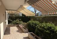 4-Zimmer-Terrassenwohnung mit ca. 100m² Garten und TG Stellplatz