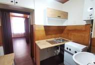 1 Zimmer für Singles oder Praxisraum mit Küche. Renovieren / sanieren. Sofortbezug auch möglich.