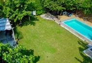 Lebensqualität pur: Großzügiges Einfamilienhaus mit traumhafter Pool-Landschaft