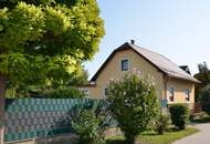 Haus mit Garten oder Gartenflächen zu verkaufen.