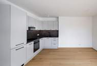 Ruhelage: Moderne DG-Wohnung mit Balkon und perfekter Anbindung