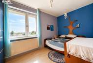 Wohnen mit Wohlfühlgarantie – 4 Zimmer, Süd-Loggia &amp; Stellplatz
