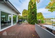 Elegantes Einfamilienhaus am See mit großzügiger Terrasse und Garten