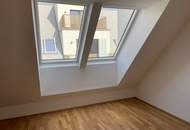 Moderne 2-Zimmer-Dachgeschosswohnung mit Komplettküche, Balkon und Kellerabteil / ALF52 3-15