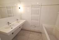 EIGENGARTEN, LORYSTRASSE, 75 m2 Neubau mit 23 m2 Garten, 2 Zimmer, Wohnküche, Wannenbad, Parketten, 1. Liftstock