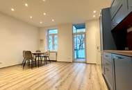 Elegante 3-Zimmerwohnung mit Balkon in saniertem Altbau