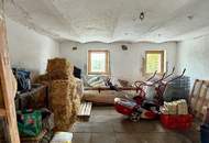 "Charmantes Einfamilienhaus mit Terrasse, Garage und zusätzlichem Grundstück"