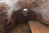 Ehemaliger Bauernhof mit Wirtschaftstrakt