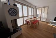 Neuwertige 2-Zimmer-Eigentumswohnung mit Kamin, Loggia und Garage