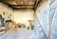 Großzügige Gartenwohnung mit Garage und viel Zubehör in Steinfeld