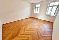 Ein Altbau, der verzaubert! Umfangreich und hochwertig sanierte Wohnschönheit mit großem Balkon und effizienter Erdwärme! Viel Privatsphäre + Viel Raum + Viel Grün!
