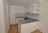 Moderne, sonnige Erdgeschoßwohnung mit Eigengarten und Tiefgarage