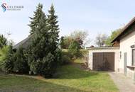 Solides Einfamilienhaus mit 3 Zimmer, Terrasse, großer Garten und 2 Garagen und Nebengebäude
