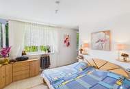 Werte für die Zukunft sichern: Großzügiges Einfamilienhaus mit Badeteich. Gartenparadies als sorgenfreies Investment.
