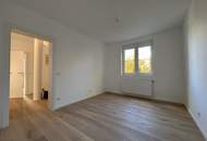 TRAUMIMMOBILIE MIT HAUSCHARAKTER! 5-Zimmer GARTENWOHNUNG mit TERRASSE + Tiefgaragenplatz! ERSTBEZUG NACH SANIERUNG!