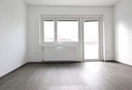 Renovierte-3-Raum-Eigentumswohnung mit Balkon und 203 m² Eigengarten