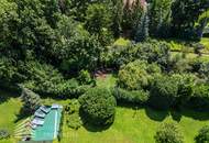 Beeindruckende Villa mit gepflegtem Garten und Pool als Investment