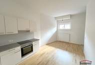 Helle 2-Zimmerwohnung mit Terrasse und Gartenanteil!