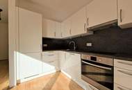 Schicke Neubauwohnung mit kl. Garten in idyllischer Ruhelage