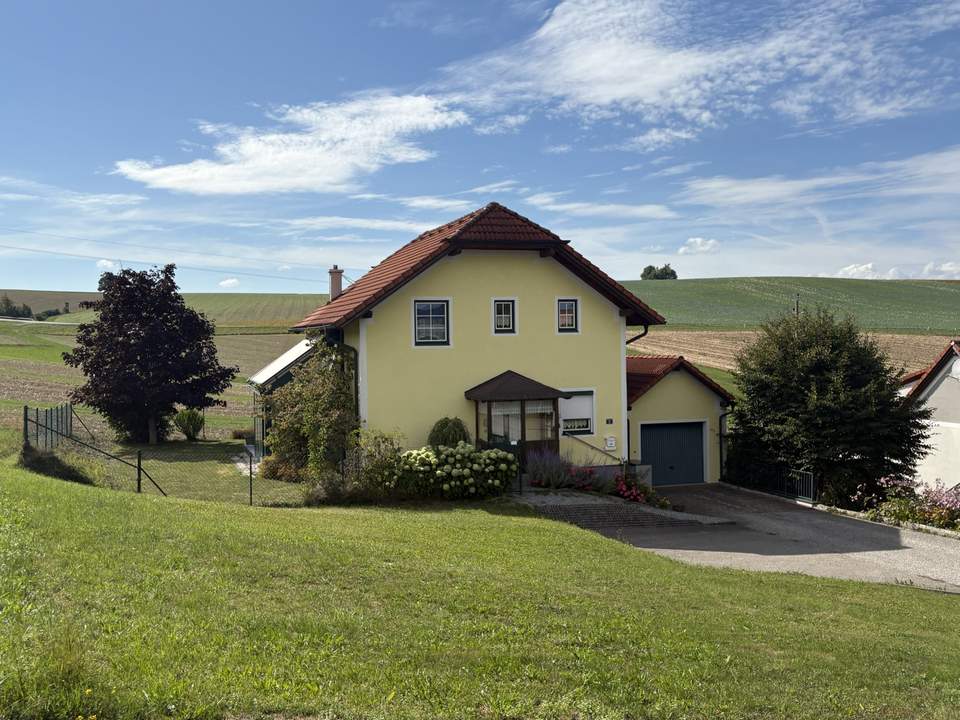 Charmantes Einfamilienhaus mit Wintergarten &amp; Garage im Grünen