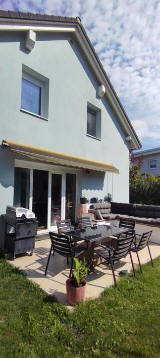 Sonnenverwöhnter Garten trifft ländlichen Charme