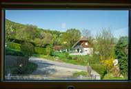 Nachhaltig wohnen mit Erdwärme – Architektenhaus in idyllischer Grünruhelage mit Weitblick