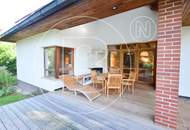 Einfamilienhaus in zentraler Bestlage mit Tennisplatz auf parkähnlichem Grund!