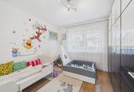 Moderner Bungalow mit Pool, Garage und Traumgarten – Wohnen auf einer Ebene