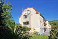 DG-Mietwohnung mit überdachter Terrasse in Pressbaumer Zentrumslage