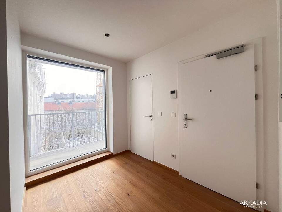 Exklusive Wohnung in 1070 – 16 m² Balkon, Klima, Designerküche, Lift und Garagenstellplatz