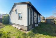 Grundstück mit voll unterkellertem Abrisshaus in ruhiger Wohngegend