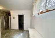 Zentral gelegenes Ein- bis Zweifamilienhaus mit großem Garten und Doppelgarage!