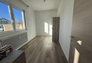 Erdgeschosswohnung mit Garten & viel Lagerfläche