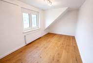 Stilvolle Doppelhaushälfte mit Garten, Designküche und überdachter Terrasse