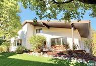 Charmantes Einfamilienhaus mit Kamin, Südterrasse und Garten in ruhiger Wohnlage