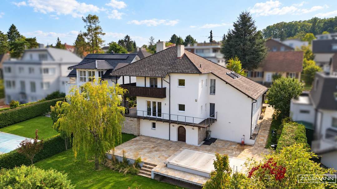 AM LAINZER TIERGARTEN | ARCHITEKTENVILLA MIT POOL – AUSSERGEWÖHNLICHE ARCHITEKTUR IN EXKLUSIVER GRÜNLAGE | ZELLMANN IMMOBILIEN