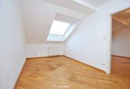 Charmante Dachgeschosswohnung mit Balkon und Lift in ausgezeichneter Lage