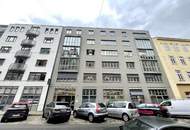 Urbanes Arbeiten im Industrial-Chic: Exklusives Büro mit Open-Space-Flair und Innenhof-Balkon