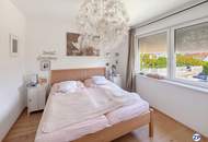 Passivhaus mit beheiztem Pool, Dachterrasse und separater Ordination – unverbaubarer Grünblick