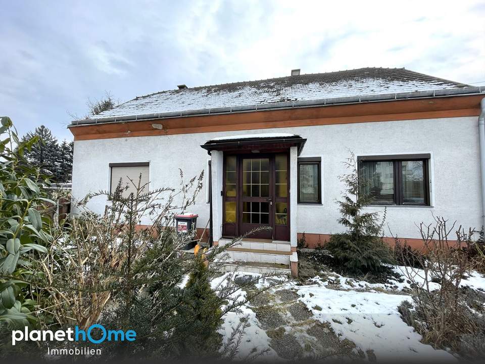 Haus mit Entwicklungspotenzial auf großzügigem Grundstück in Top Lage