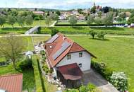 GERÄUMIGES EINFAMILIENHAUS MIT EBENEM GRUNDSTÜCK