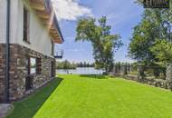 An Exceptional Waterfront Retreat with Private Beach and Unrivaled Privacy